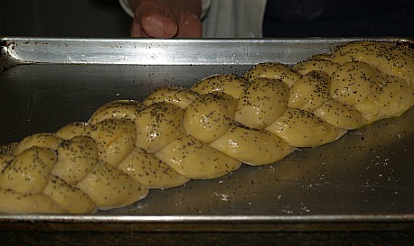 Unbaked Six Braid Challah Bread After Rising