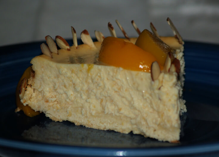 Peaches and Cream Amaretto Cheesecake Recipe Piece