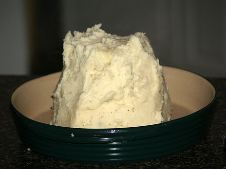 mashed potatoes shaped like volcano
