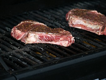 Barbequeing Steaks on the Grill