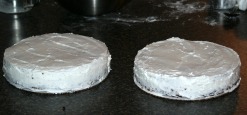 Frosted Black Cake Ready for Fondant