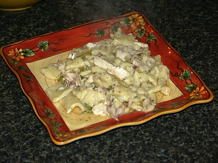 Serving Chicken and Dumplings