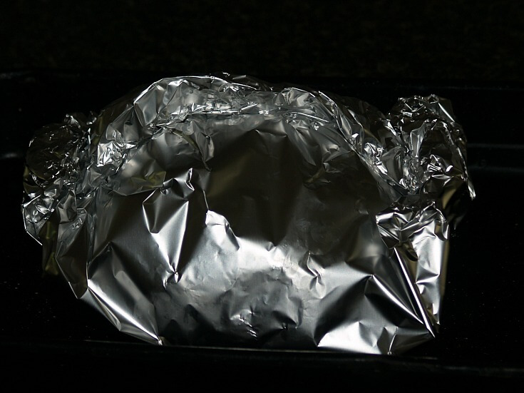 Seal the Foil Around Salt Covered Chicken