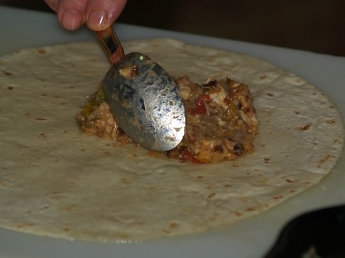 Fill Tortilla with Cooked Filling