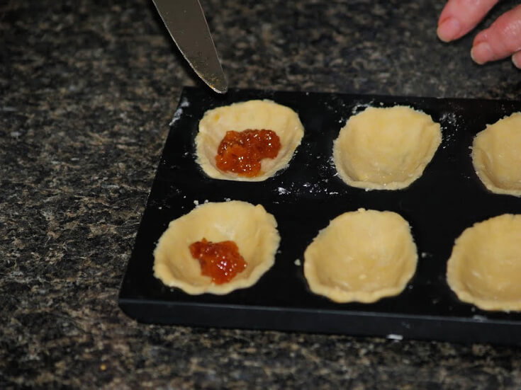 Step Two: Spoon Apricot Jam into Dough Shells