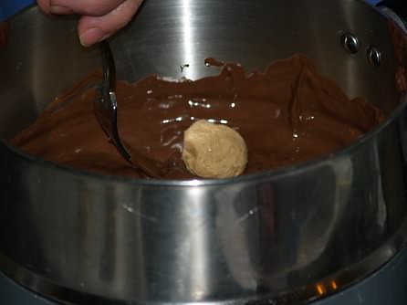 Dipping Truffle in Chocolate