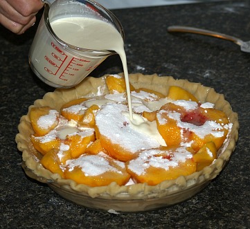 Pour Cream Mixture Over Sugar Mixture on Peaches