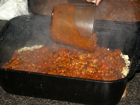 Dip Hot Mixture Over Noodles in the Pan