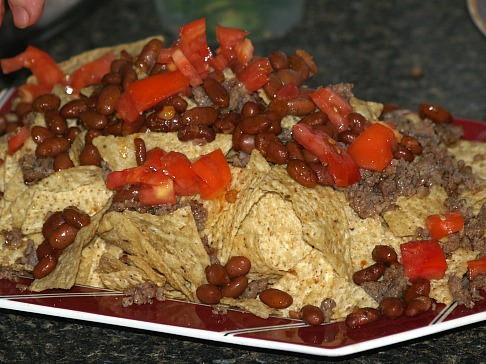 Sprinkle Tomatoes Over Nachos