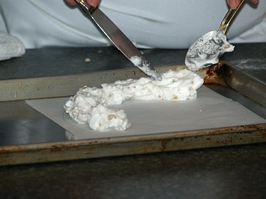 Spoon Meringue onto a Baking Sheet