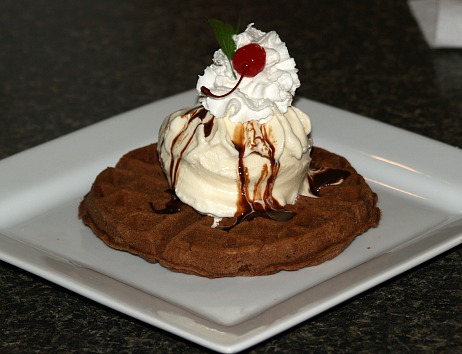 Brownie Waffle or Chocolate Waffle Recipe Topped with Vanilla Ice Cream and Whipped Cream