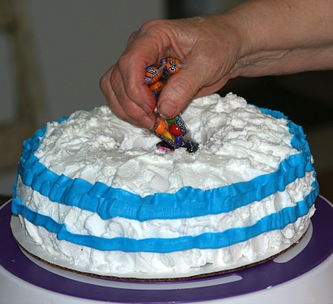 Filling the Pinata Clown Cake with Candy