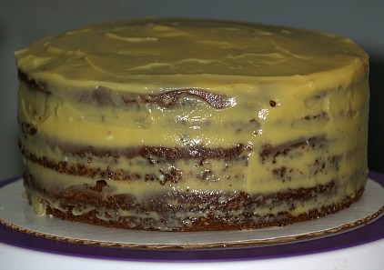 Putting Almond Filling Between Layers and Coating Top and Sides