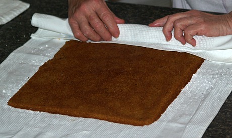 rolling the pumpkin cake