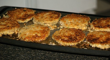 Zucchini Patties Frying on Griddle