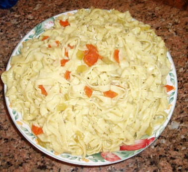 homemade noodles cooked with chicken broth