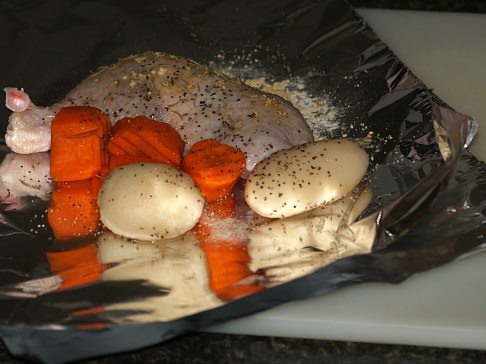 Preparing Chicken Dinner In Foil