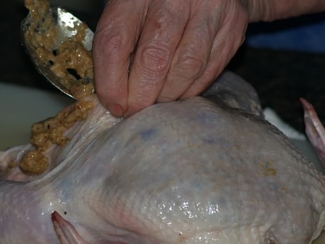 Placing Stuffing Under Chicken Skin