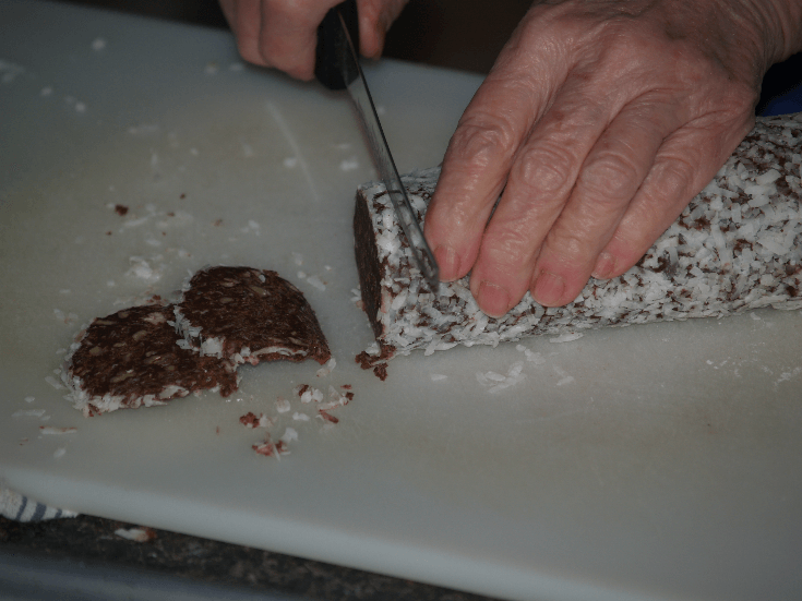 Slicing Coconut Chocolate Pecan Crisps