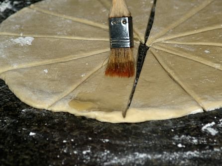 Brushing Crescent Rolls with Butter before Rolling