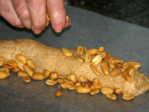 Adding Peanuts to the Dough Log