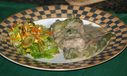 Round Steak Served with a Side Salad