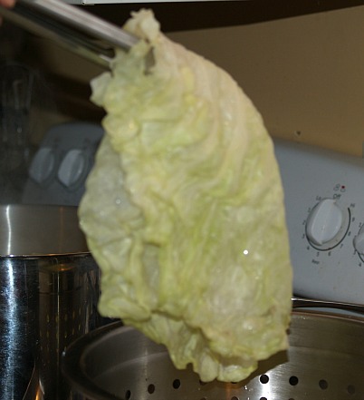 preparing cabbage to stuff and roll