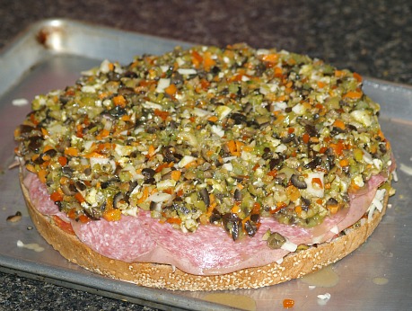 Assembling a Muffaletta Sandwich