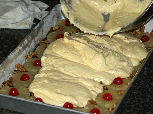 Pouring Cake Batter for Pineapple Upside Down Cake