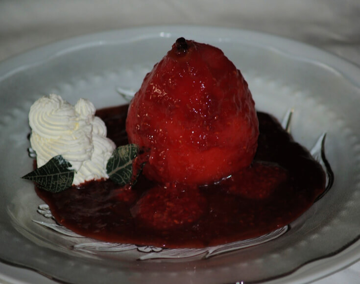 Raspberry Poached Pears Served with a Chocolate Raspberry Sauce